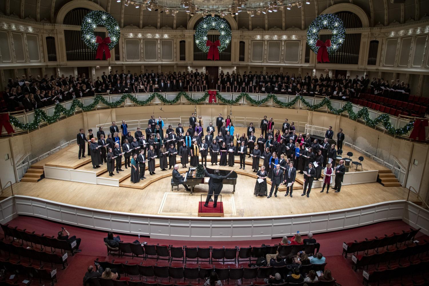 The <a href='http://bax.infosecureredteam.com'>bv伟德ios下载</a> Choir performs in the Chicago Symphony Hall.